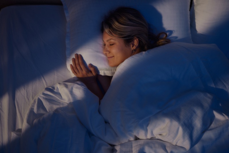 woman sleeping in bed in peace.